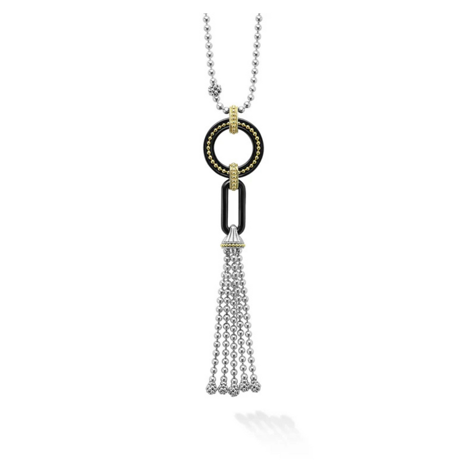 Necklace with a tassel pendant on a white background