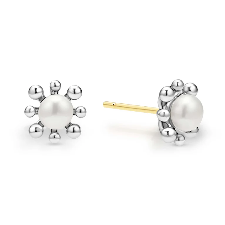 Pair of pearl stud earrings with silver and gold accents on a white background