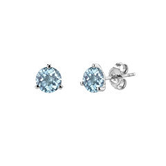 A pair of martini-style stud earrings with round aquamarine stones set in 14K white gold.
