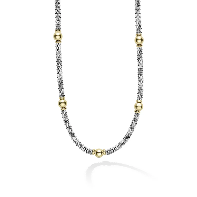 silver necklace with gold stations