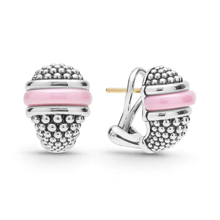 Silver earrings with pink accents on a white background