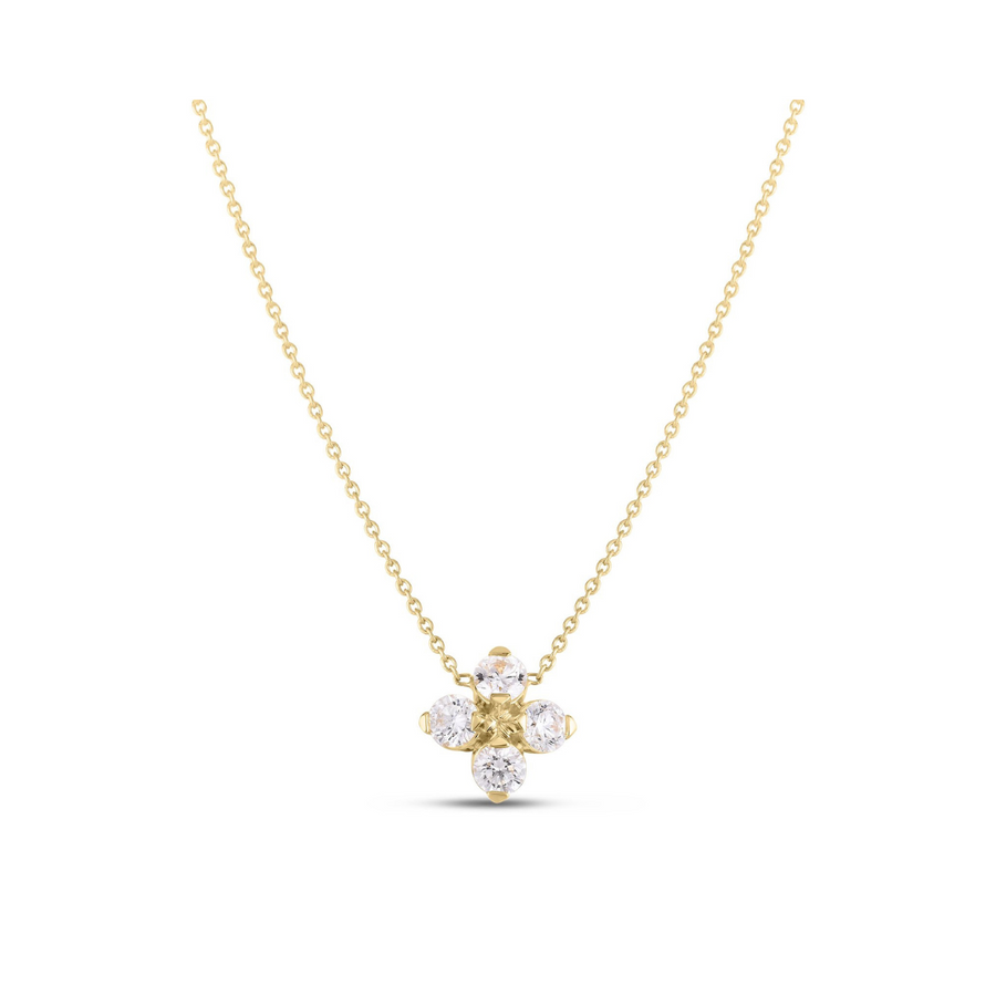 Gold necklace with a star-shaped pendant on a white background