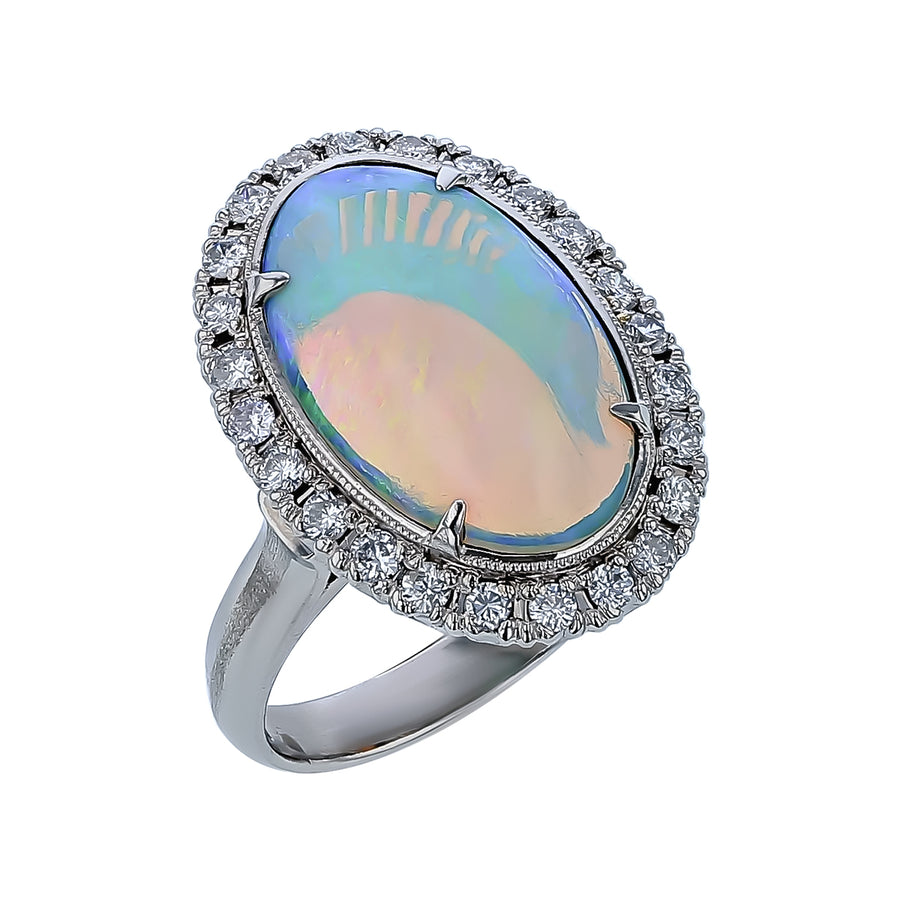 Oval Opal and 0.40ct Diamond Halo Ring in Platinum, size 6.5