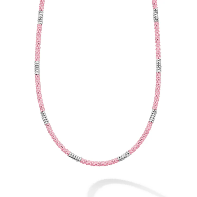 Necklace with pink beads on a white background