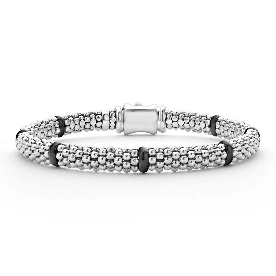 A black and silver beaded rope bracelet with a station design, displayed against a white background.