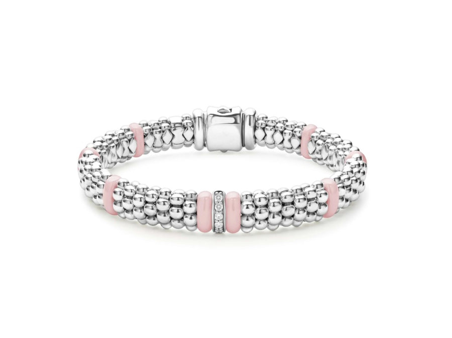 A sterling silver and ceramic bracelet with pink beaded details and diamond accents, size 7.