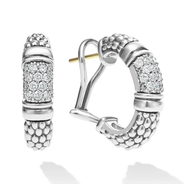 Silver hoop earrings with diamond accents on a white background