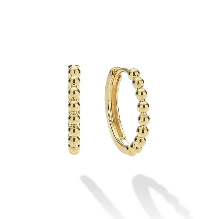 Gold hoop earrings with beaded design on a white background