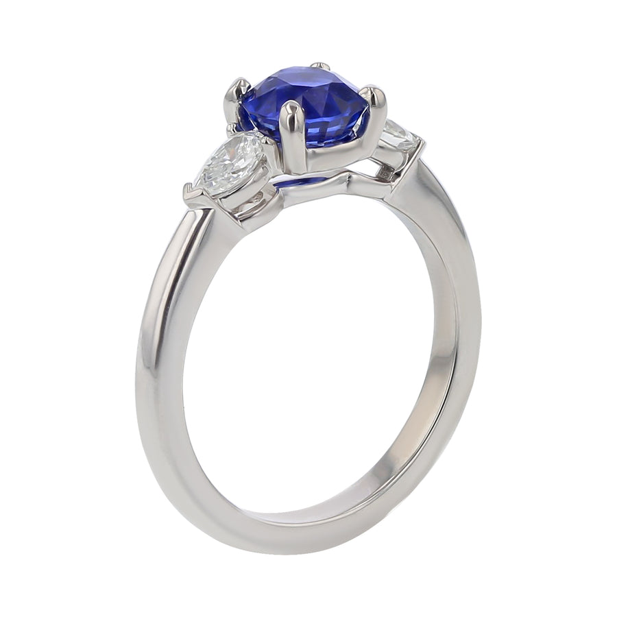 1.45ct Round Sri Lankan Sapphire and 0.37ct Pear Shape Diamond Three Stone Ring in Platinum, Size 6.5