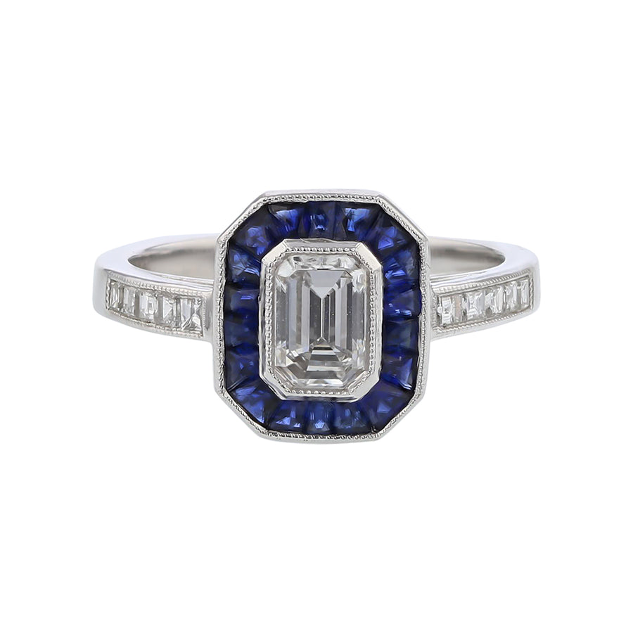 0.68ct Emerald Cut Diamond 0.25ct Square Cut Diamonds and 0.75ct French Cut Sapphire Ring in Platinum