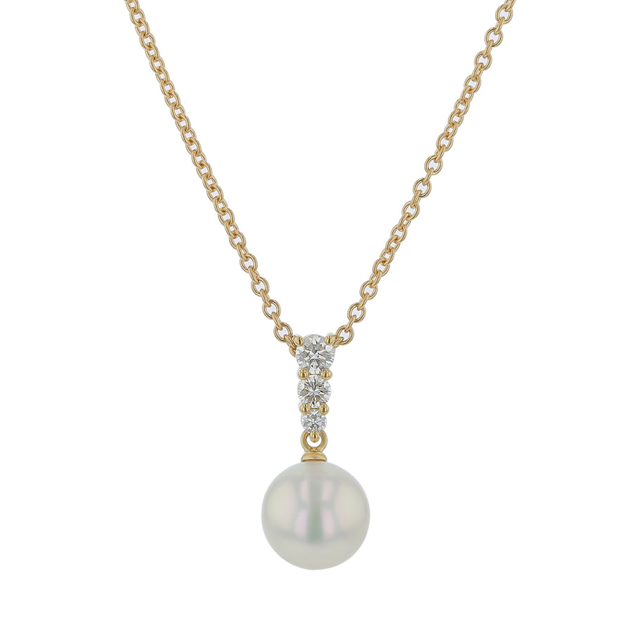 Akoya pearl and diamond pendant in 18K yellow gold with an 18-inch chain.