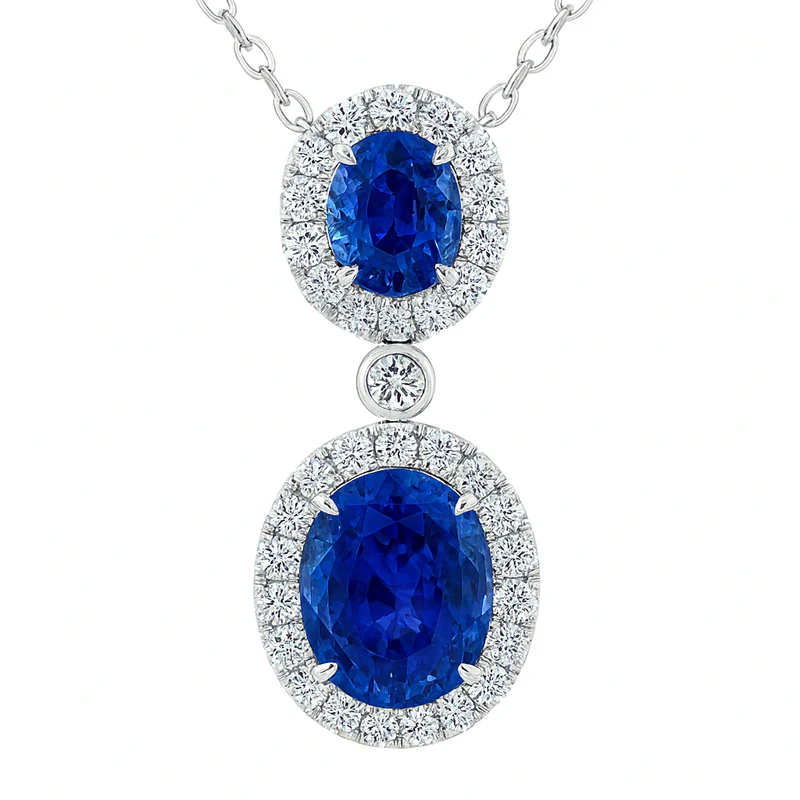 3.08ct Oval Blue Sapphire and 0.48ct Diamond Halo Pendant in 18K White Gold, 16-18" chain