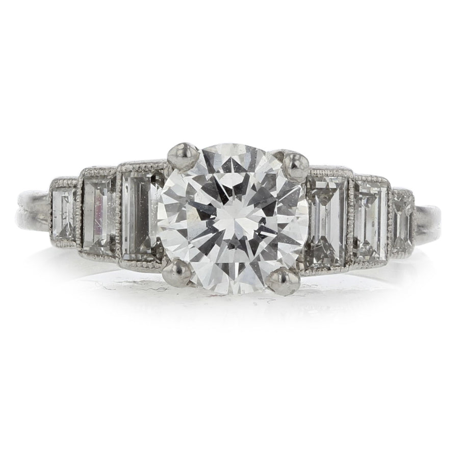 PLATINUM 1 ROUND BRILLIANT DIAMOND=1.00CT EGL 6 STRAIGHT BAGUETTE DIAMONDS=0.44CTS RING