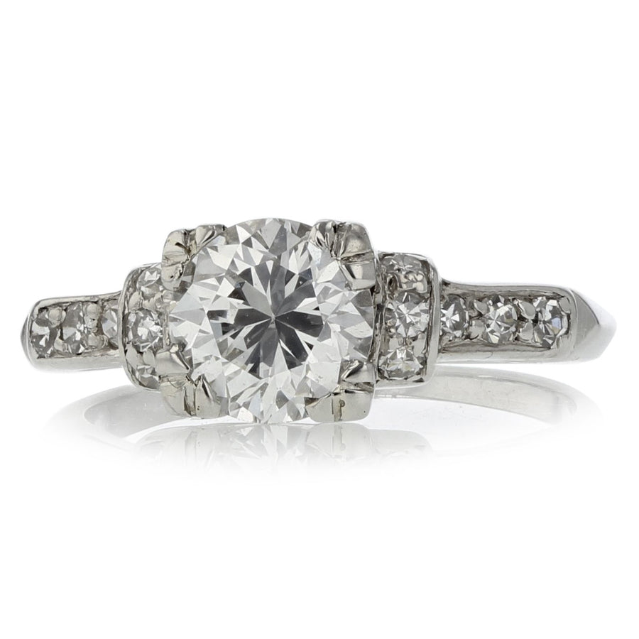 PLATINUM 1 ROUND BRILLIANT=1.25CT AND 12 SINGLE CUT DIAMONDS=0.18CT RETRO RING CIRCA 1930S