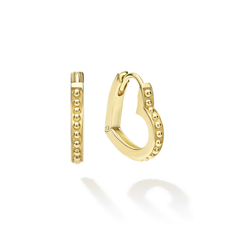 Gold hoop earrings on a white background